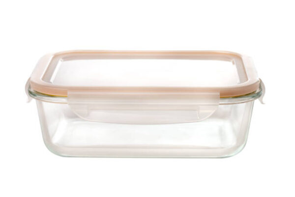 Glass container on a white background. food container close up.